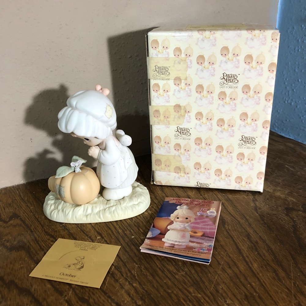 Precious Moments October figurine